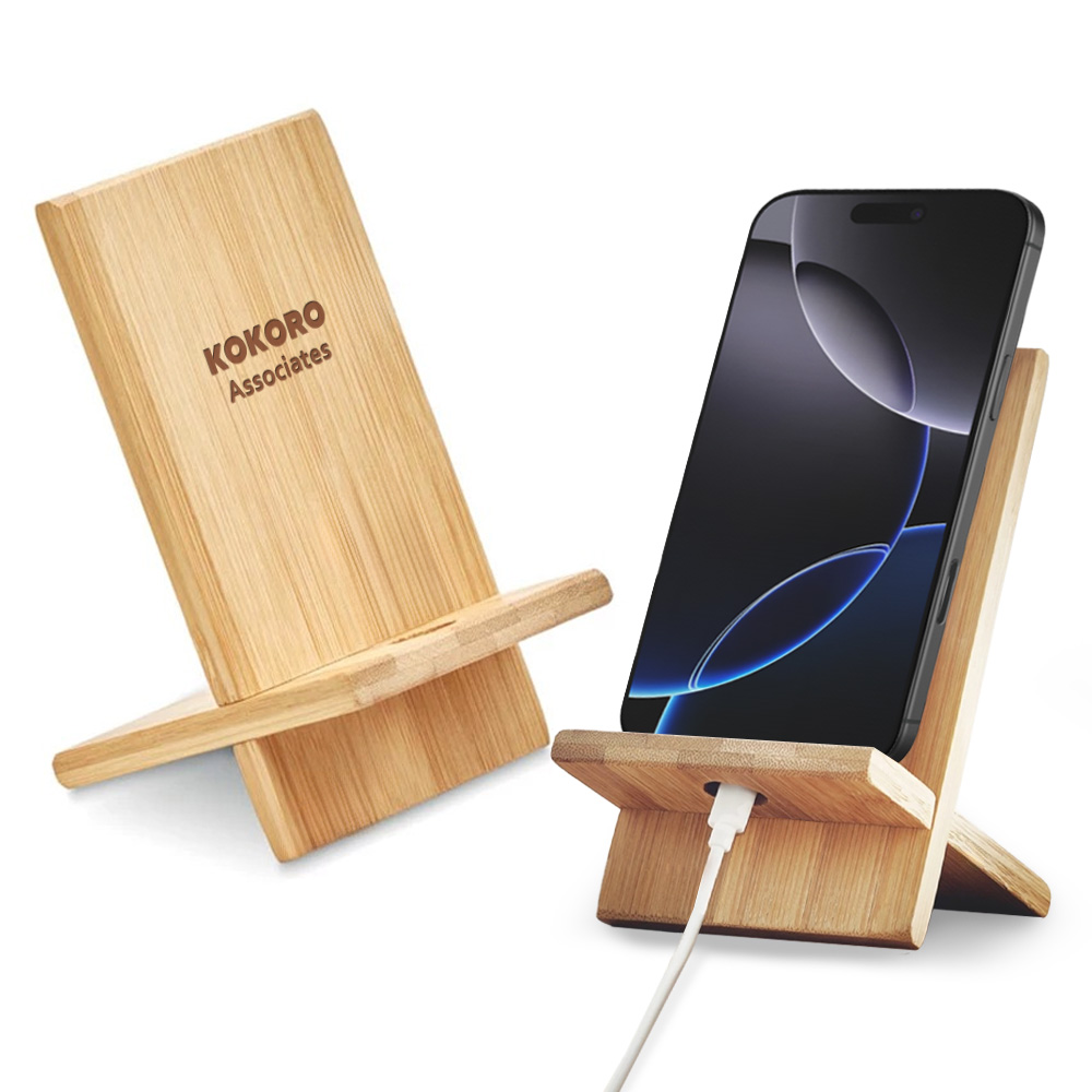 Bamboo phone stands with engraved Kokoro Associates branding